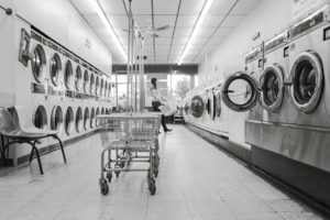 black and white photo of laundromat